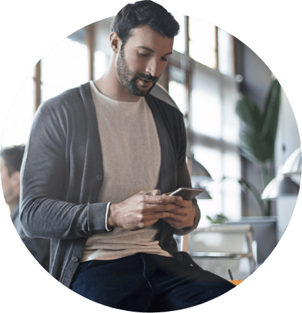 Man examining smart phone device