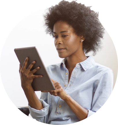 View of person holding tablet device