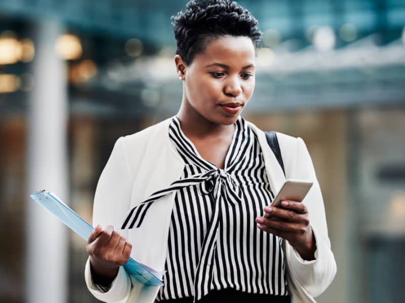 View of person holding tablet device