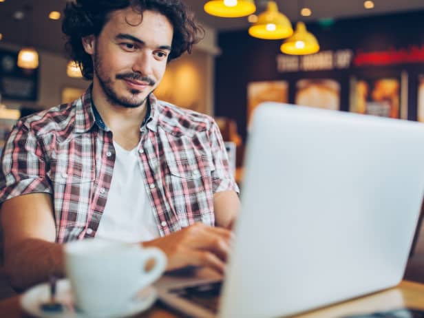 View of person holding tablet device