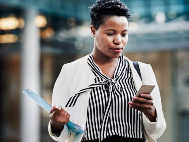 View of person holding tablet device