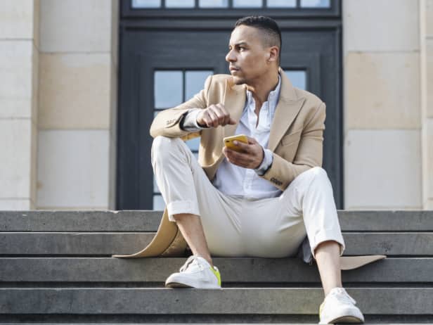 View of person holding tablet device