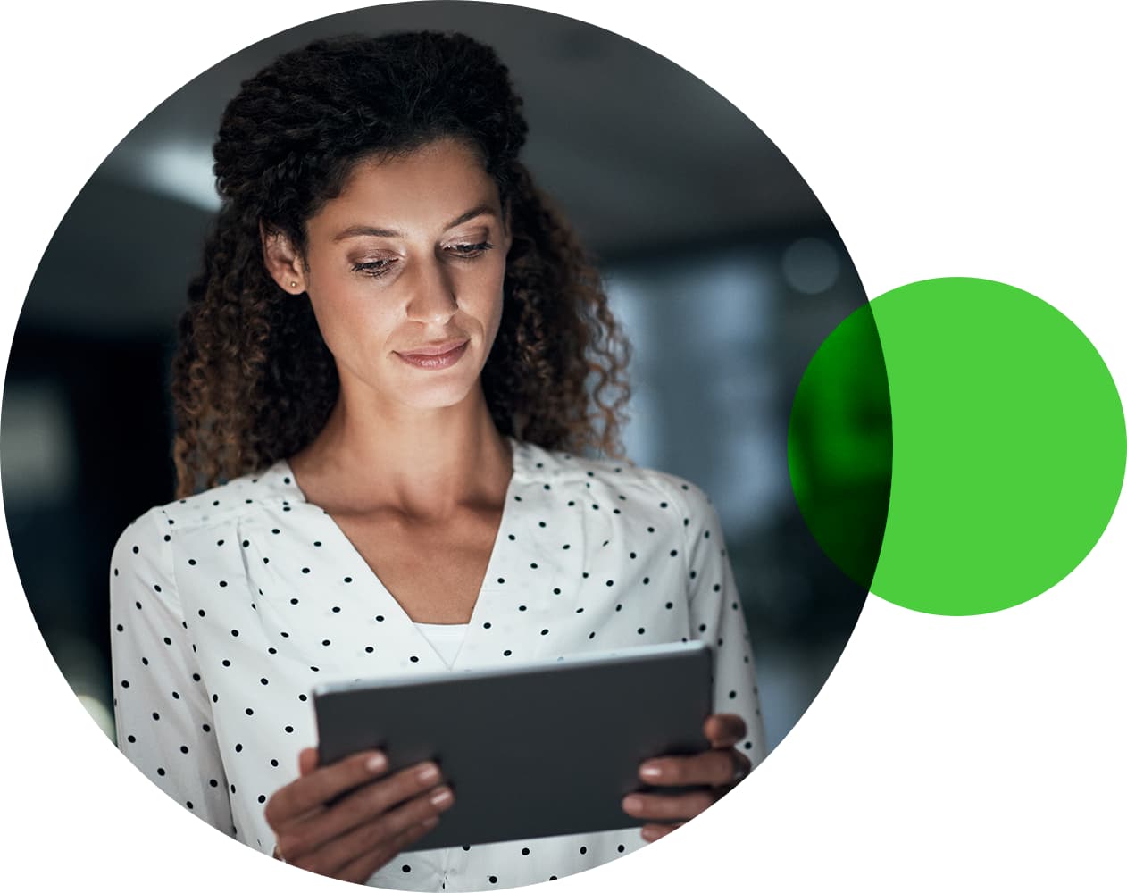 Woman wearing business suit looking at computer screen