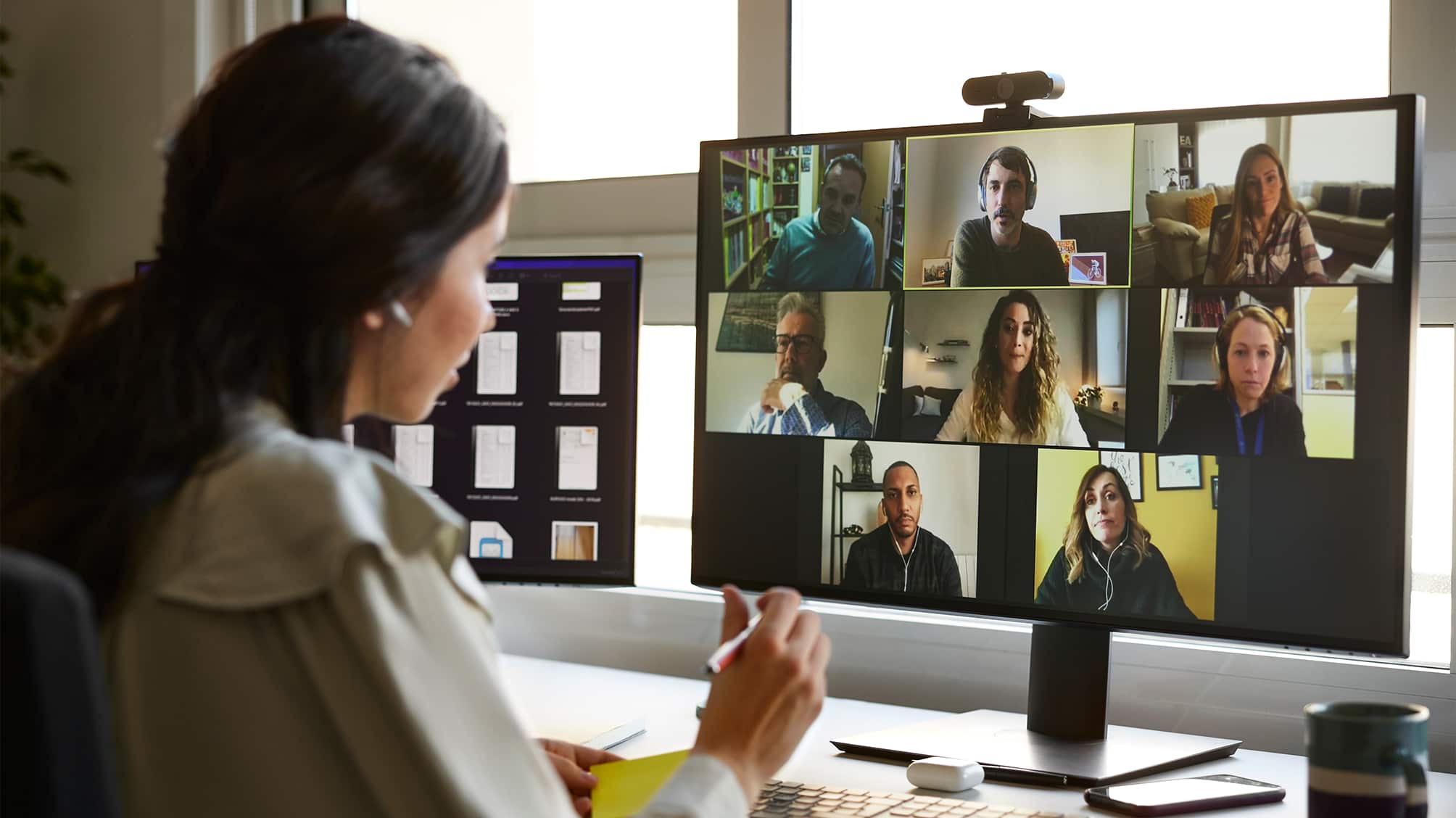 woman attending meeting online